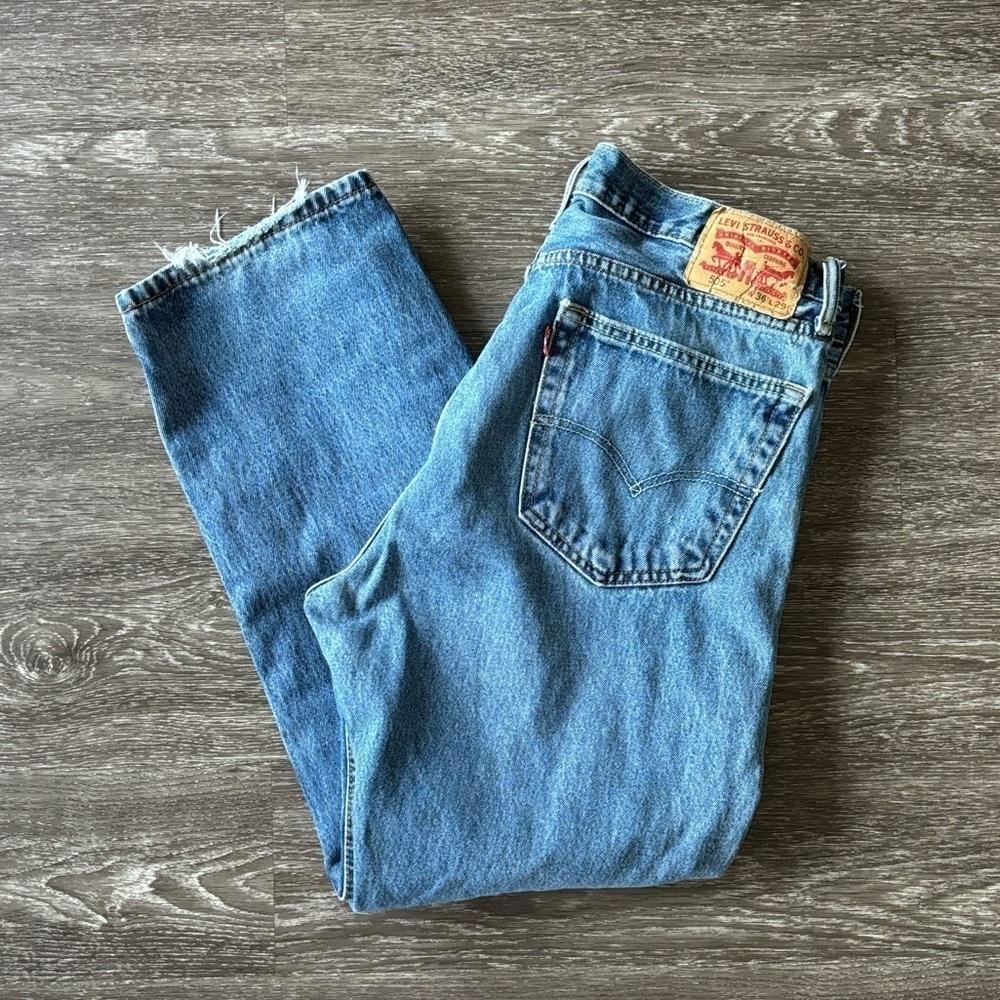 Levi’s 505 distressed denim jeans